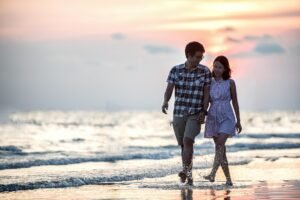 Best Valentine prayers for relationships: Couple praying together while holding hands